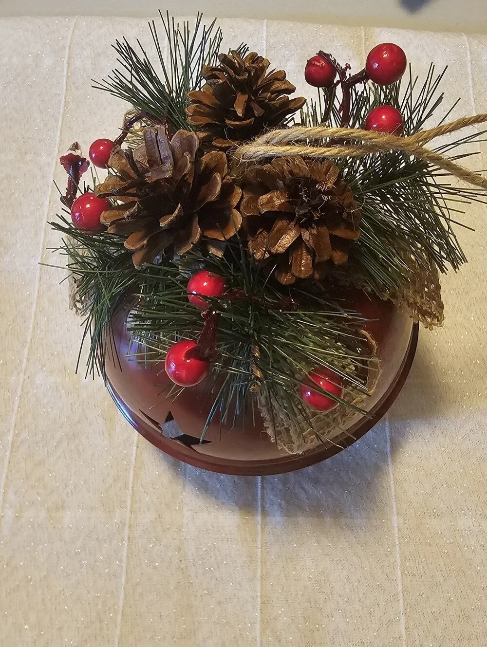 Large Rustic Red Bell Christmas Decor with Star Cutouts & Burlap Bow